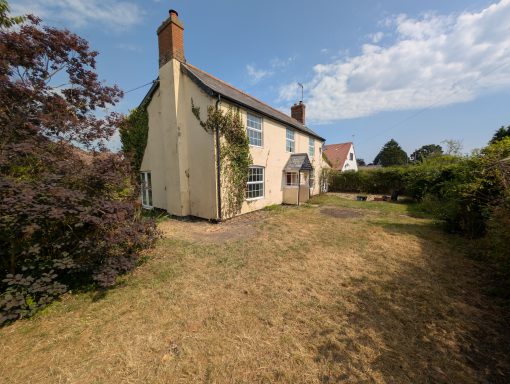 Front garden in Wattisham showing extensive clearing of beds in front of house, as well as removal of multiple trees