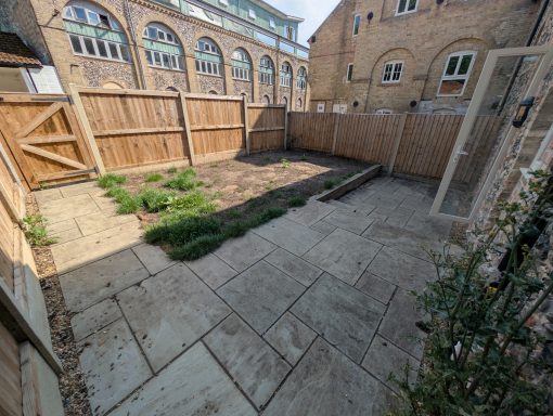 An unappealing mud patch where a turfed garden once was