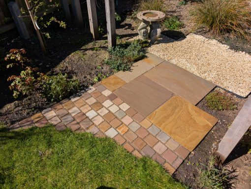 Patio paving and Setts after pressure washing in Bury St Edmunds