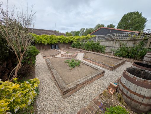 Restored gravel garden and raised beds in Barham