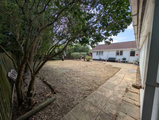 The same patio and garden after the clearance is complete